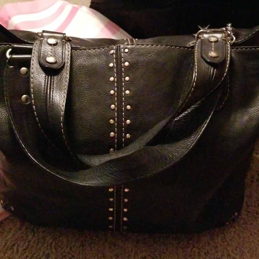 M.K. PURSE.